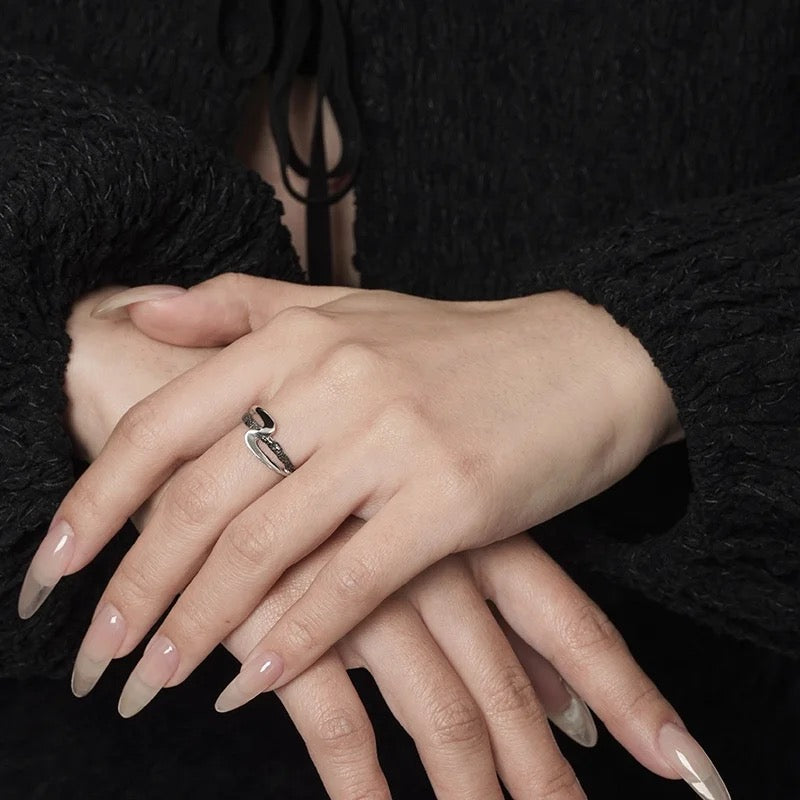 Two-tone silver ring.