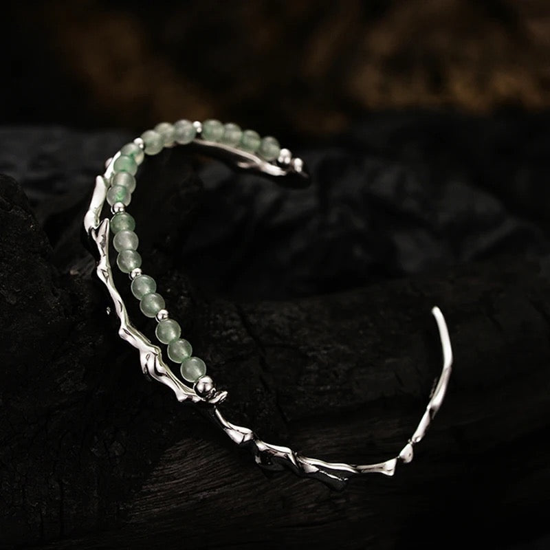 Branch shaped bracelet with green jade.
