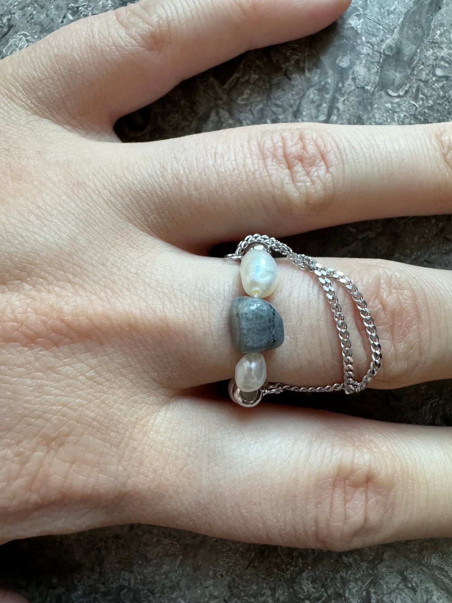 Pearl ring with chain and amazonite stone.