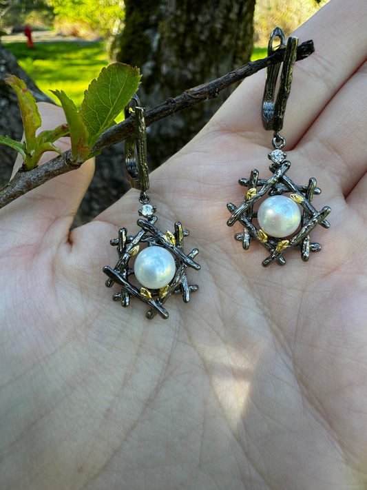 Silver earrings with button pearl and zircon
