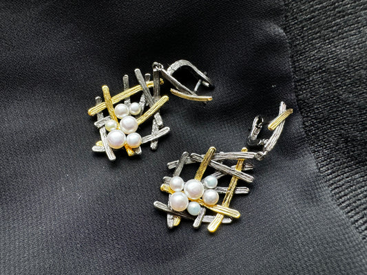 Sterling silver earrings with tiny pearls