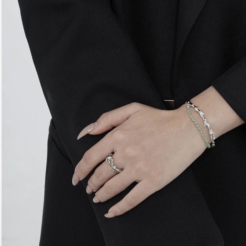 Branch shaped bracelet with green jade.