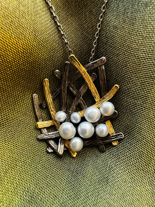 Sterling silver pendant necklace with pearls