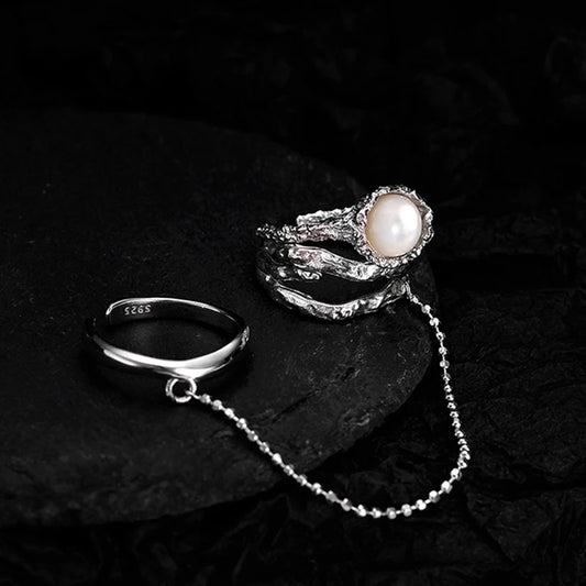 Double ring with shell stone and chain