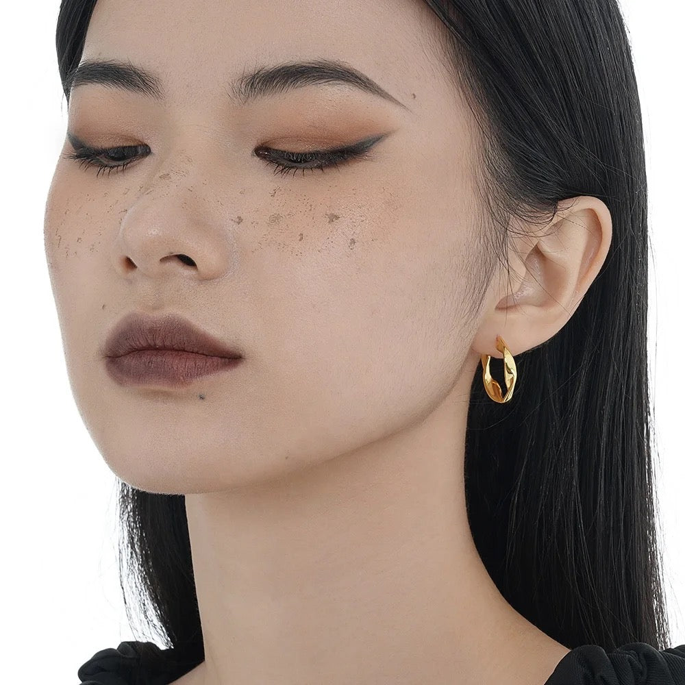 Gold plated earrings.