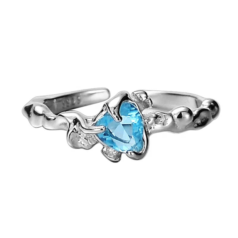 Ring with heart zircon