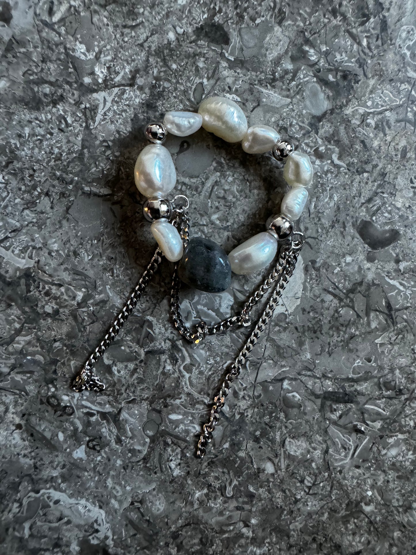 Pearl ring with chain and amazonite stone.