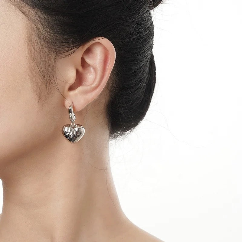 Heart shaped earrings.