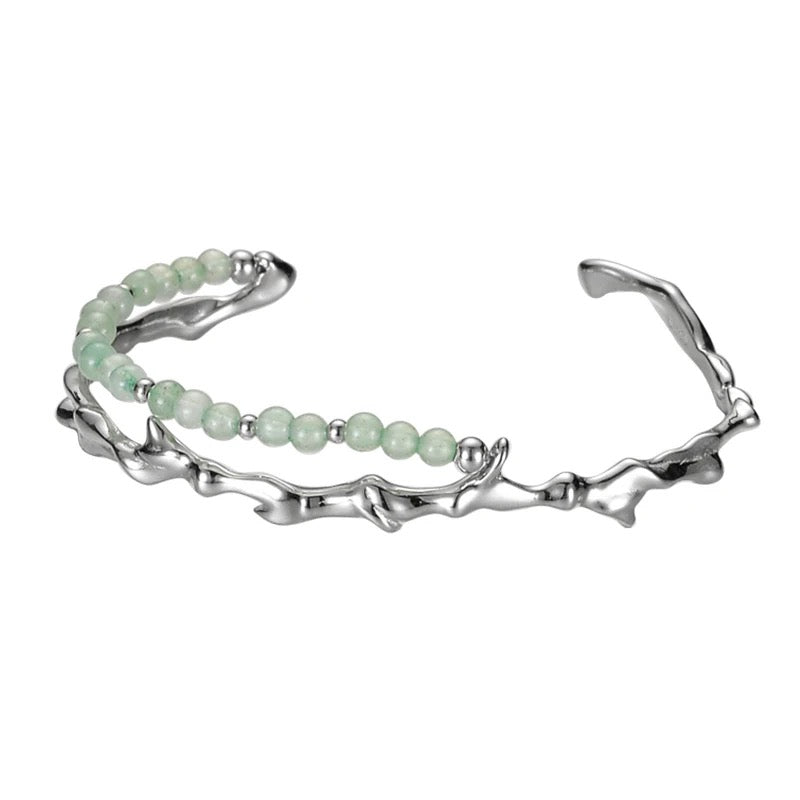 Branch shaped bracelet with green jade.