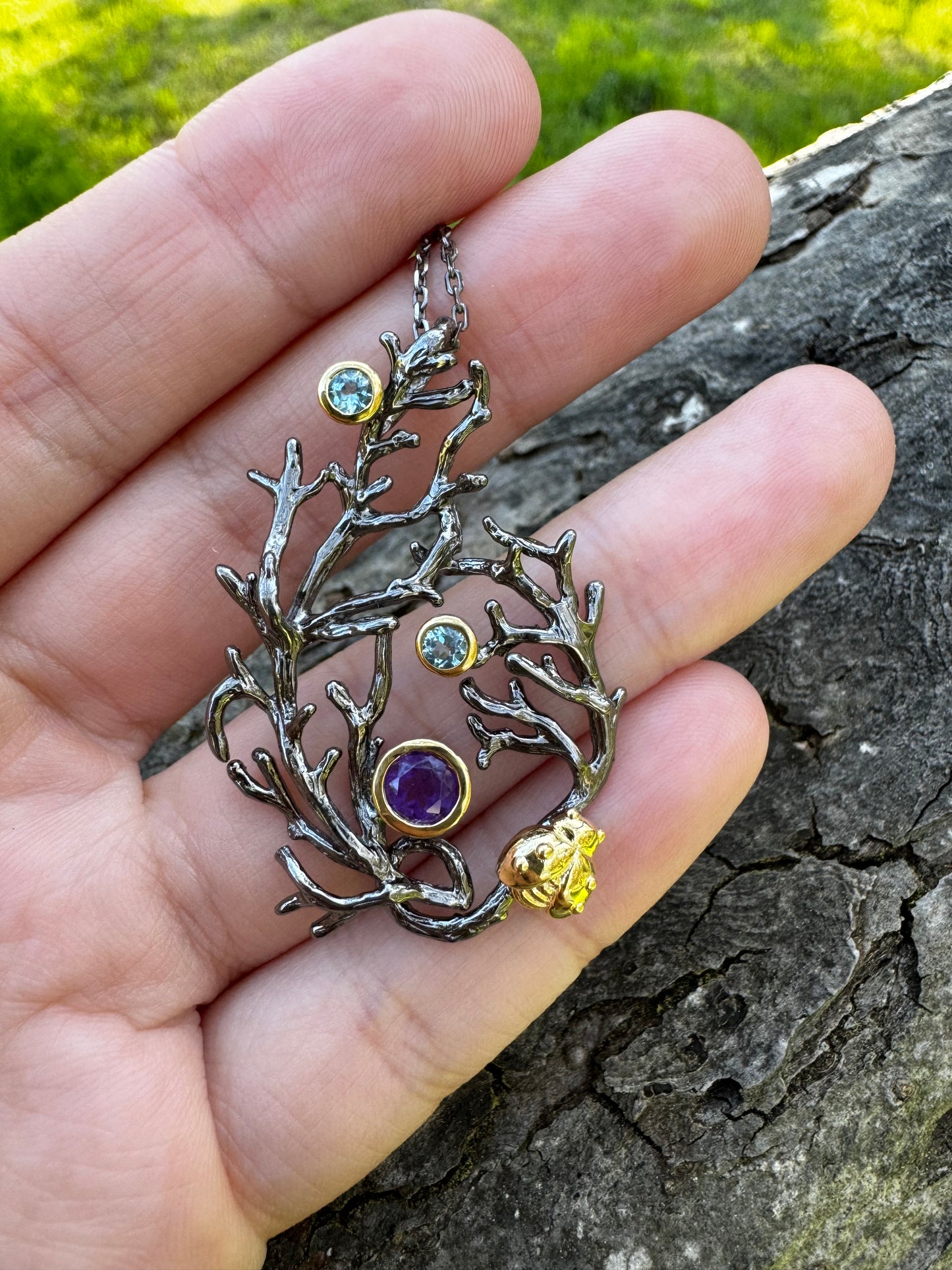 Sterling silver pendant necklace with amethyst and blue topaz