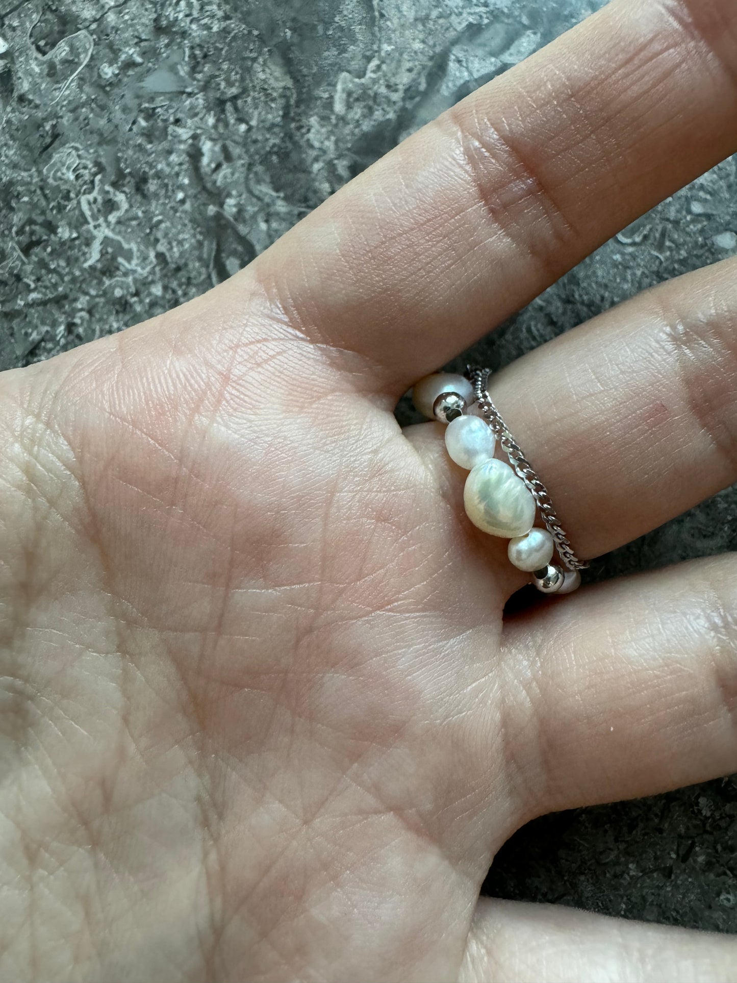 Pearl ring with chain and amazonite stone.