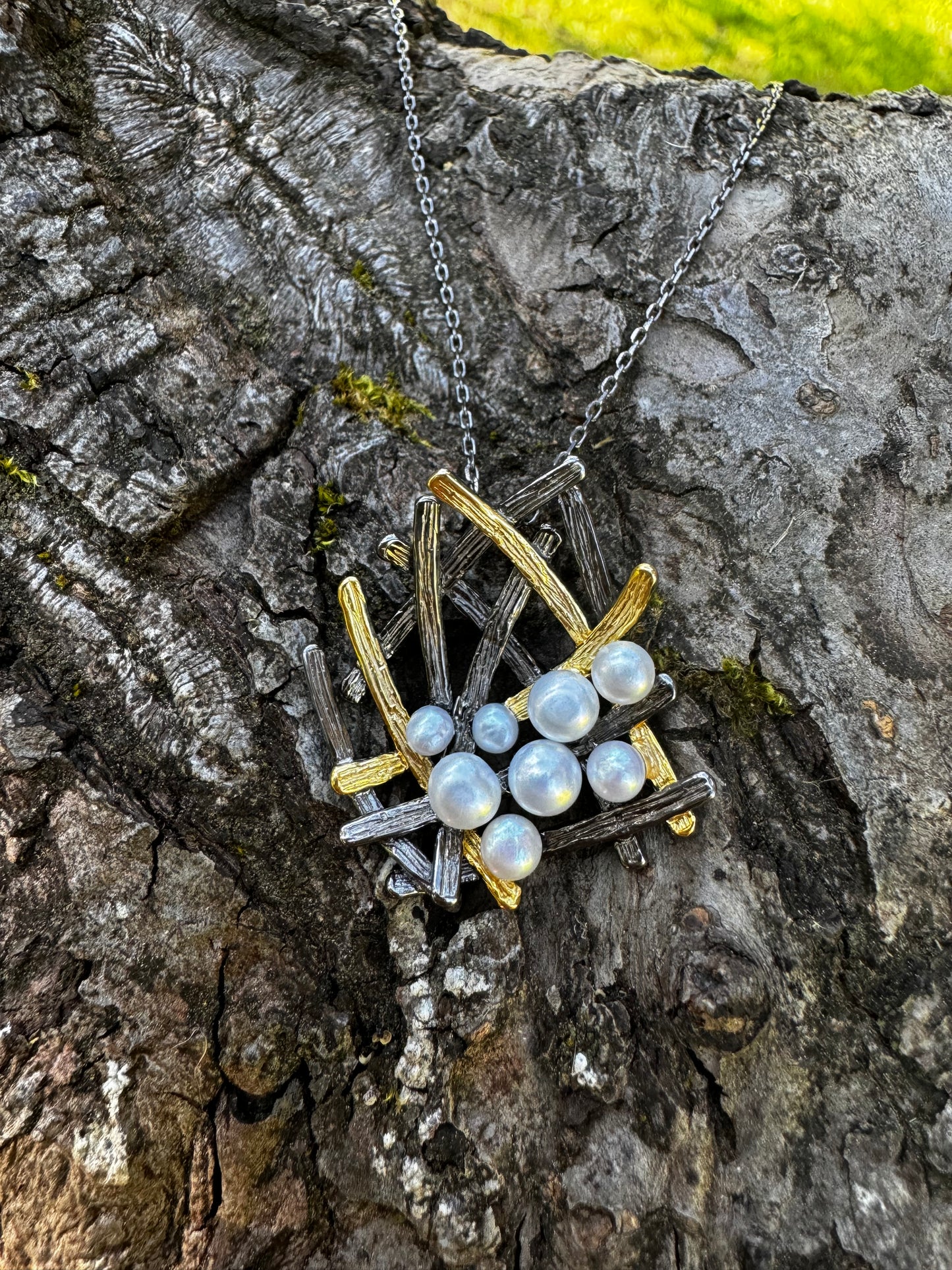 Sterling silver pendant necklace with pearls