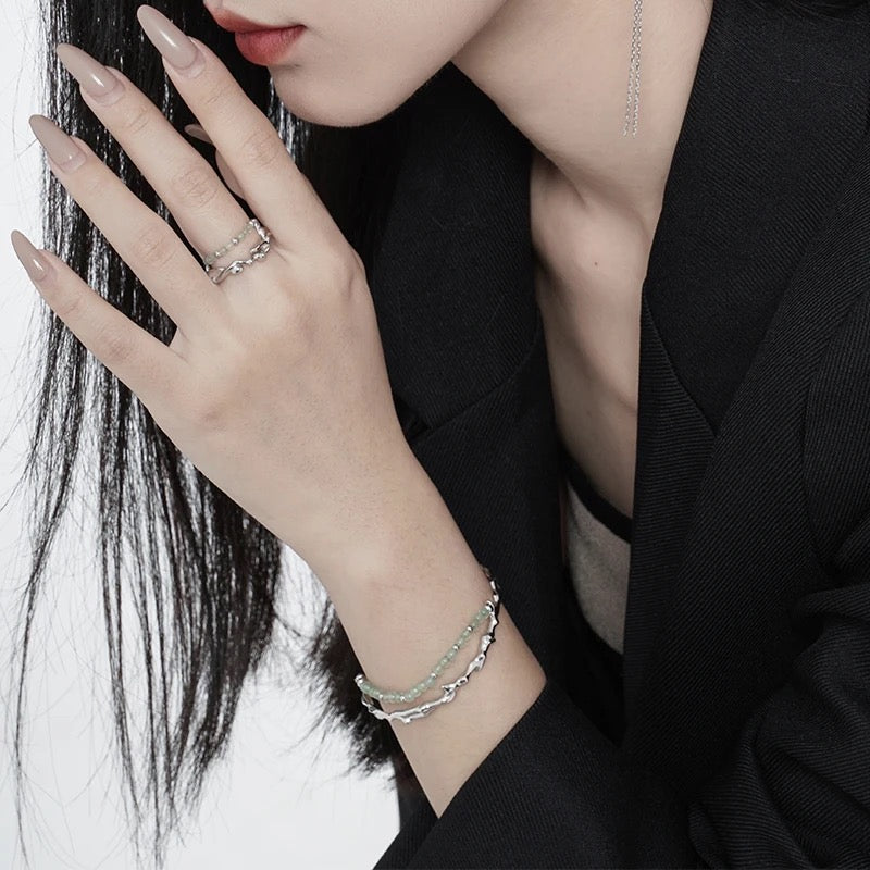 Branch shaped bracelet with green jade.