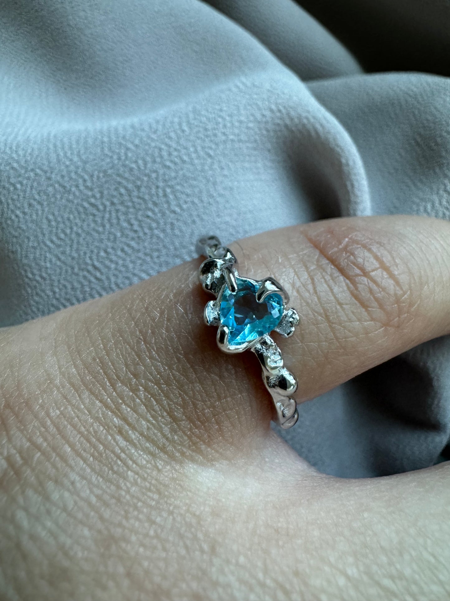 Ring with heart zircon