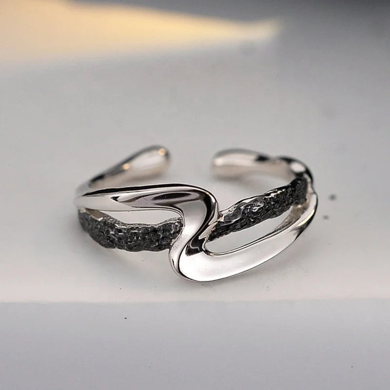 Two-tone silver ring.