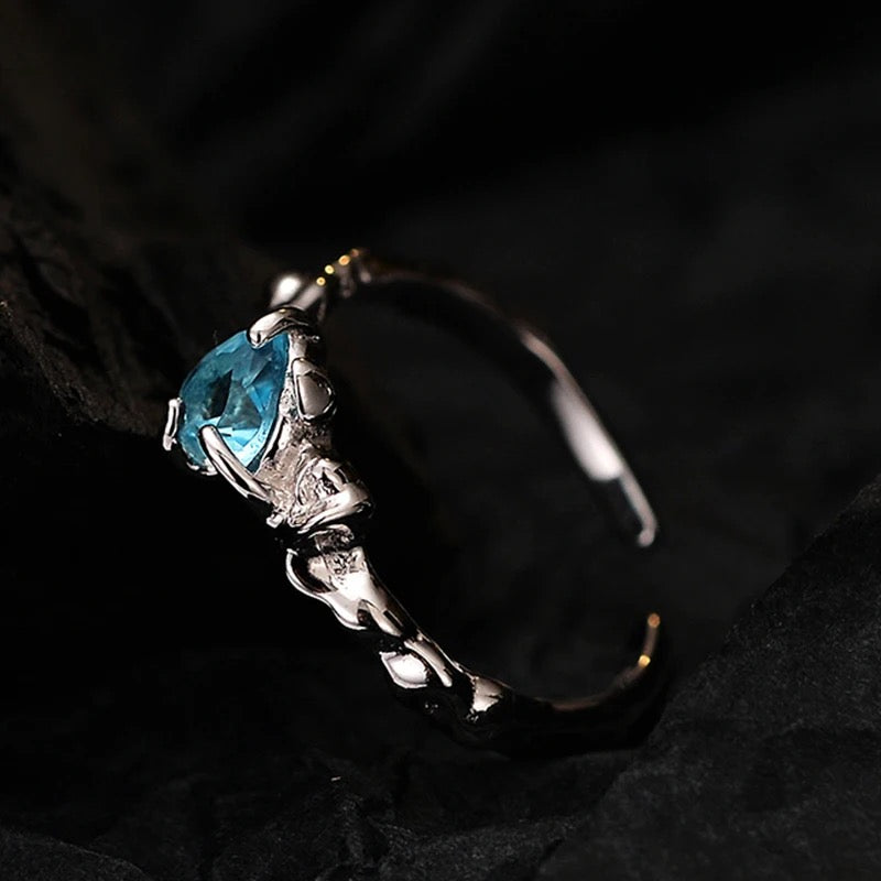 Ring with heart zircon