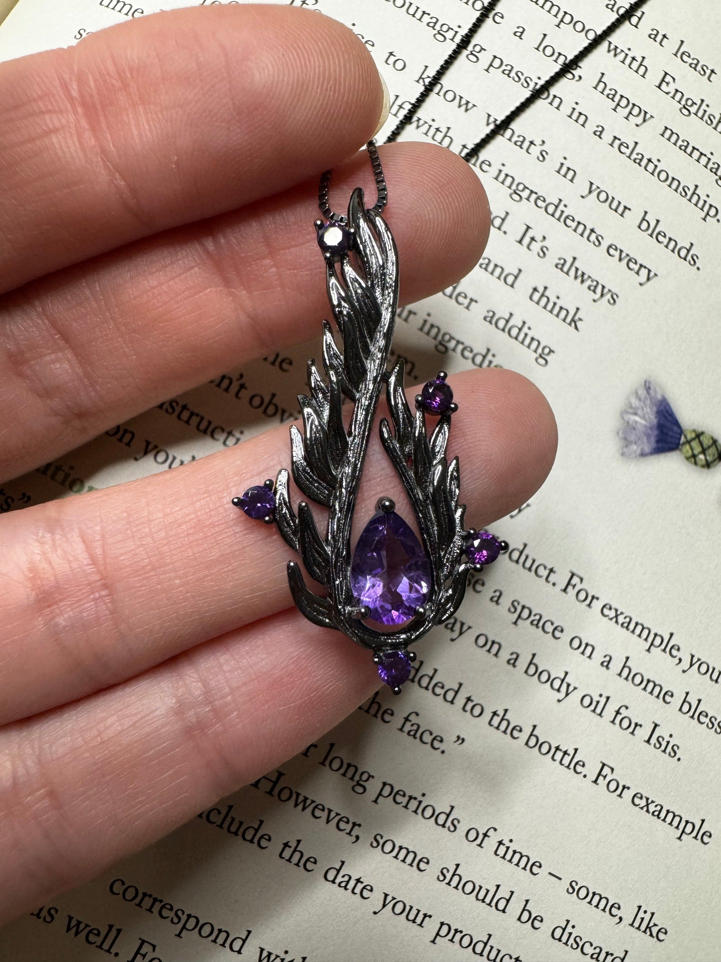 Silver necklace with amethysts