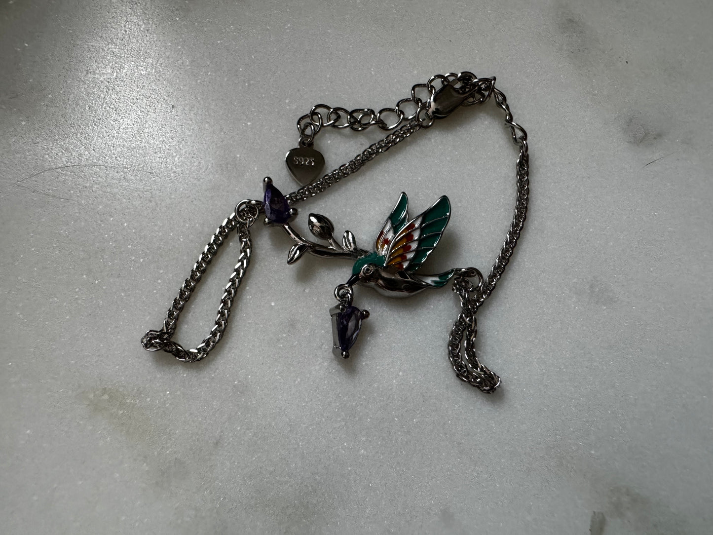 Bracelet with enamel bird