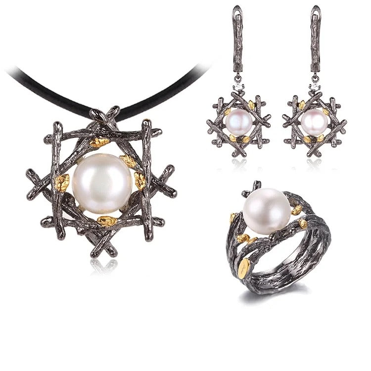 Silver earrings with button pearl and zircon