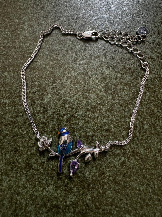 Bracelet with enamel bird
