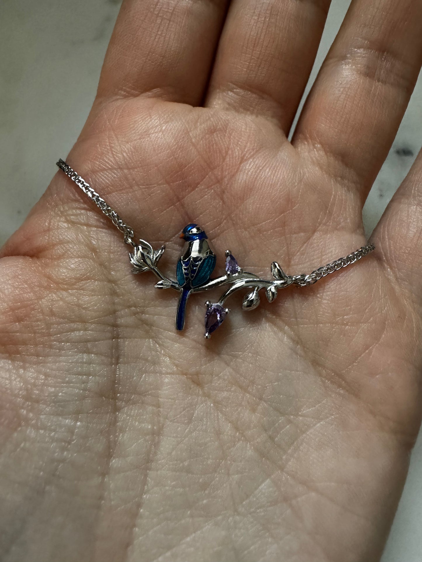 Bracelet with enamel bird
