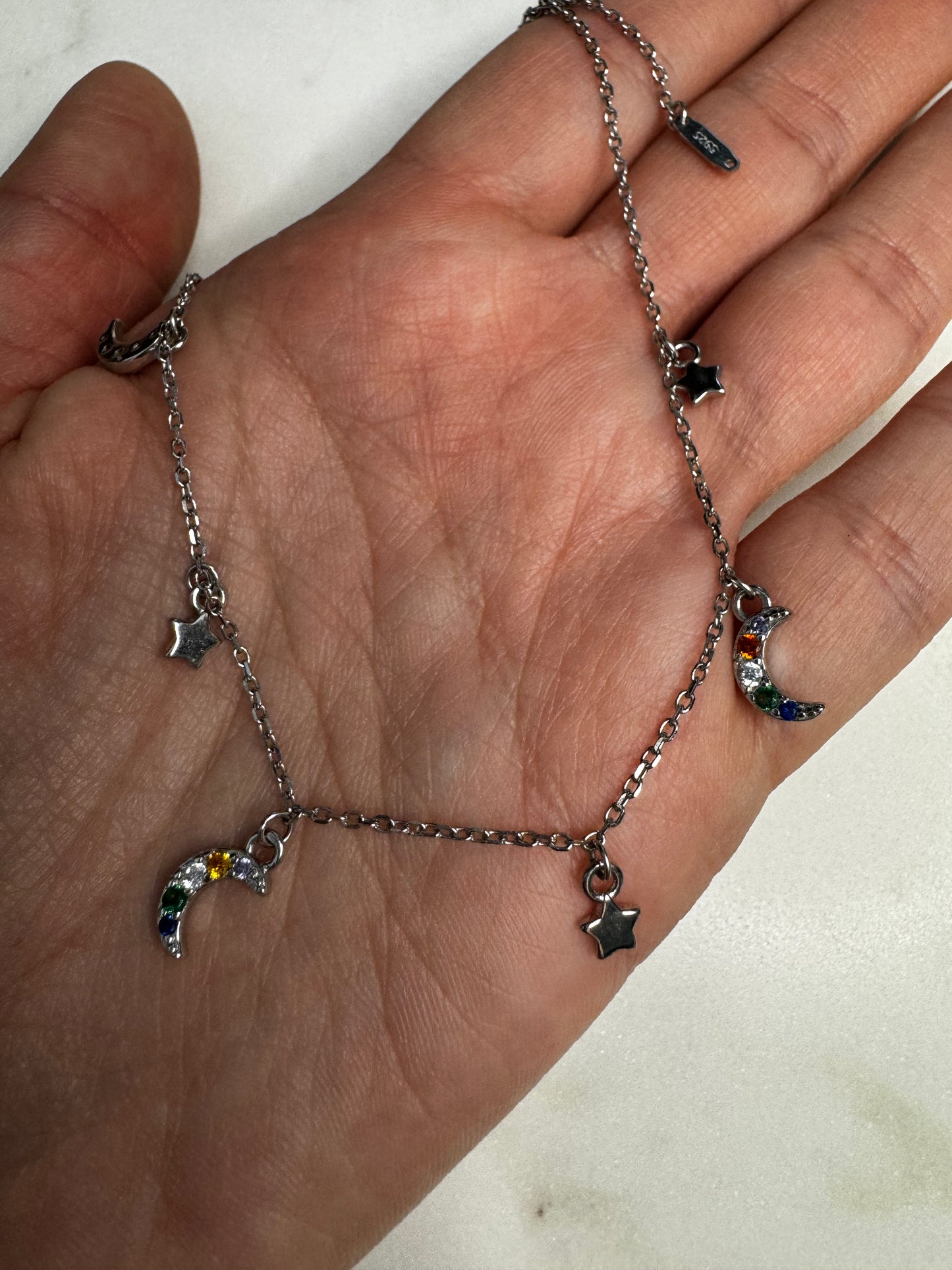 Necklace with moons and stars
